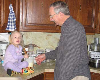 Groupie Bob teaching the next generation how to make me pancakes.